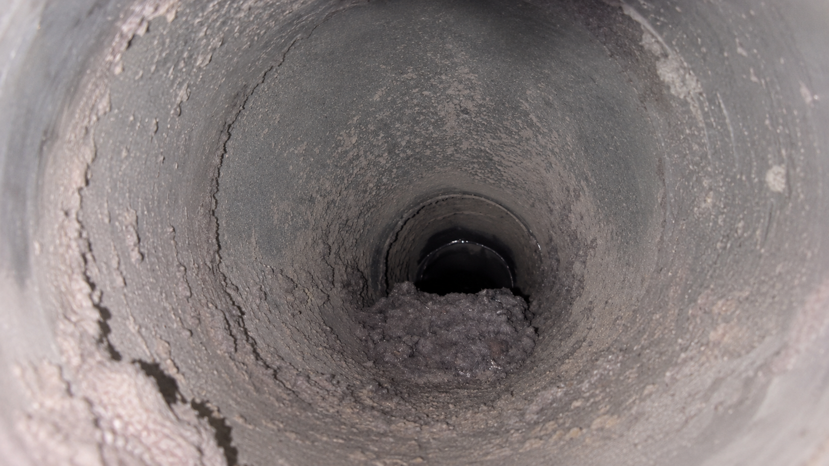 Conduit de sécheuse obstrué par la charpie avant nettoyage par Nettoyage Exl-Or